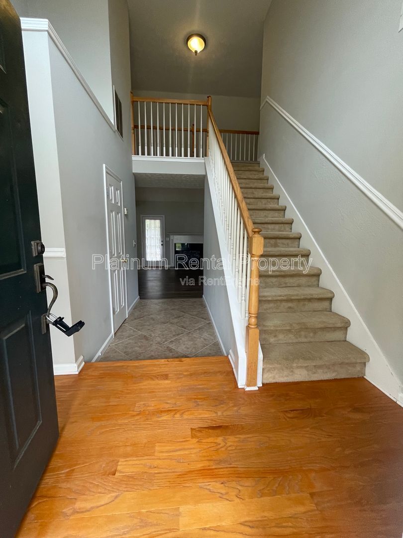 Desirable 4 bedroom floorplan featuring primary suite on the main level by Platinum Property Management Services, Inc. property image