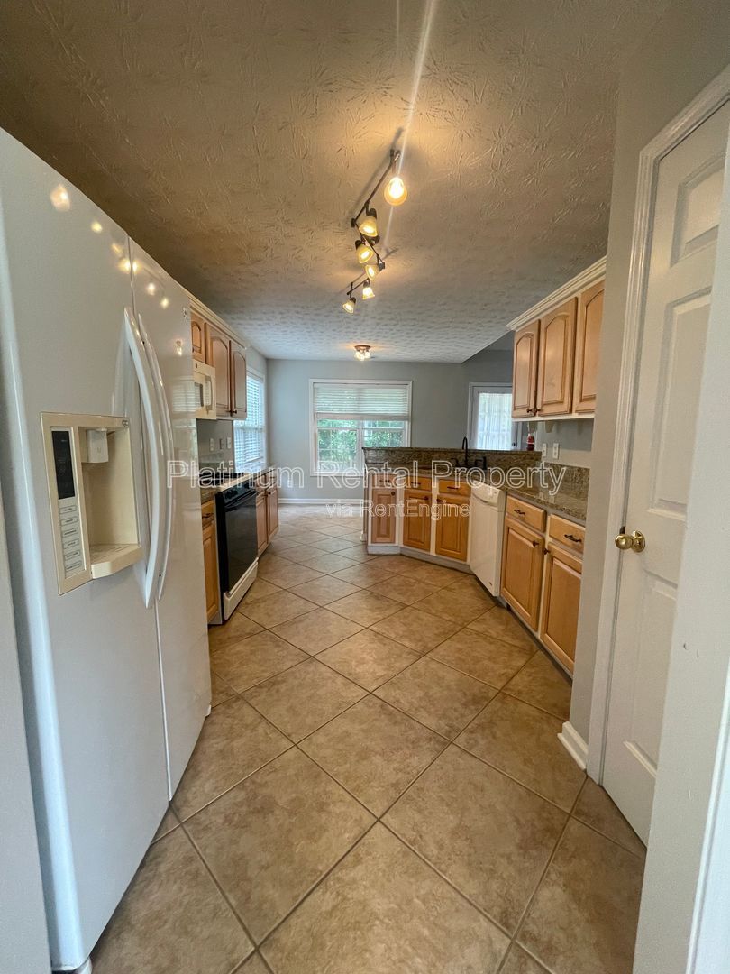 Desirable 4 bedroom floorplan featuring primary suite on the main level by Platinum Property Management Services, Inc. property image