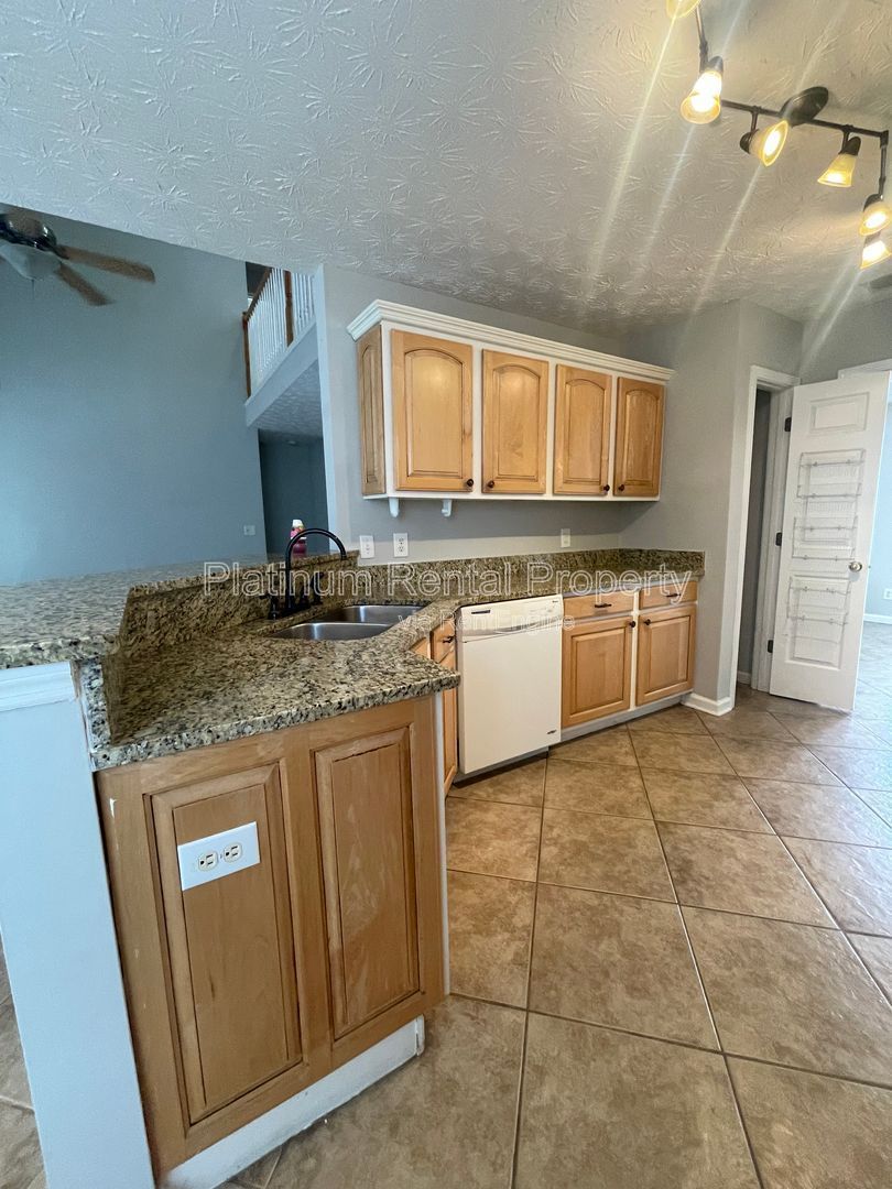 Desirable 4 bedroom floorplan featuring primary suite on the main level by Platinum Property Management Services, Inc. property image