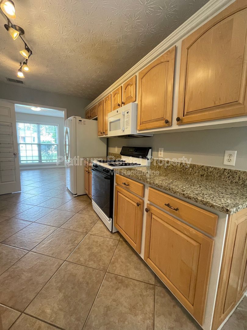 Desirable 4 bedroom floorplan featuring primary suite on the main level by Platinum Property Management Services, Inc. property image