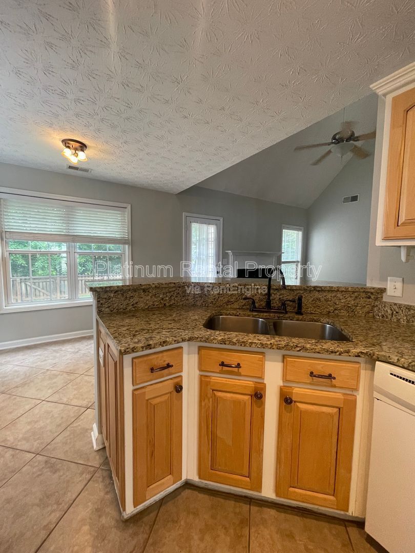 Desirable 4 bedroom floorplan featuring primary suite on the main level by Platinum Property Management Services, Inc. property image