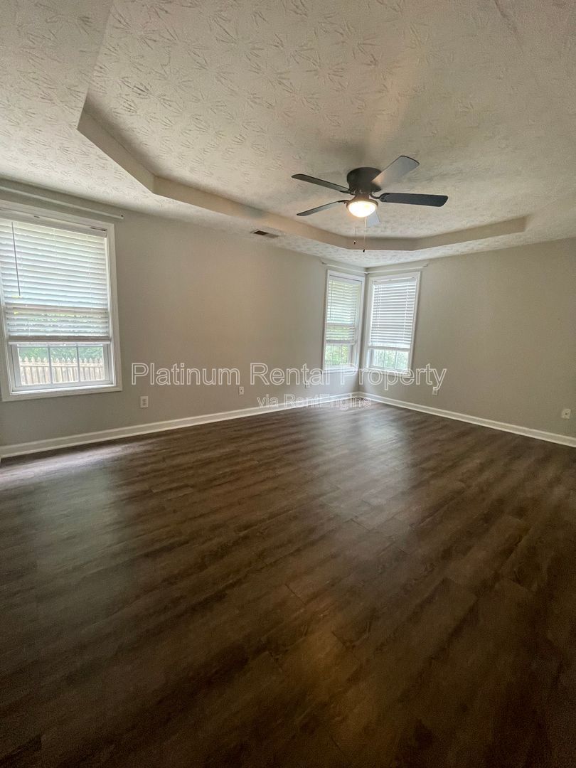 Desirable 4 bedroom floorplan featuring primary suite on the main level by Platinum Property Management Services, Inc. property image