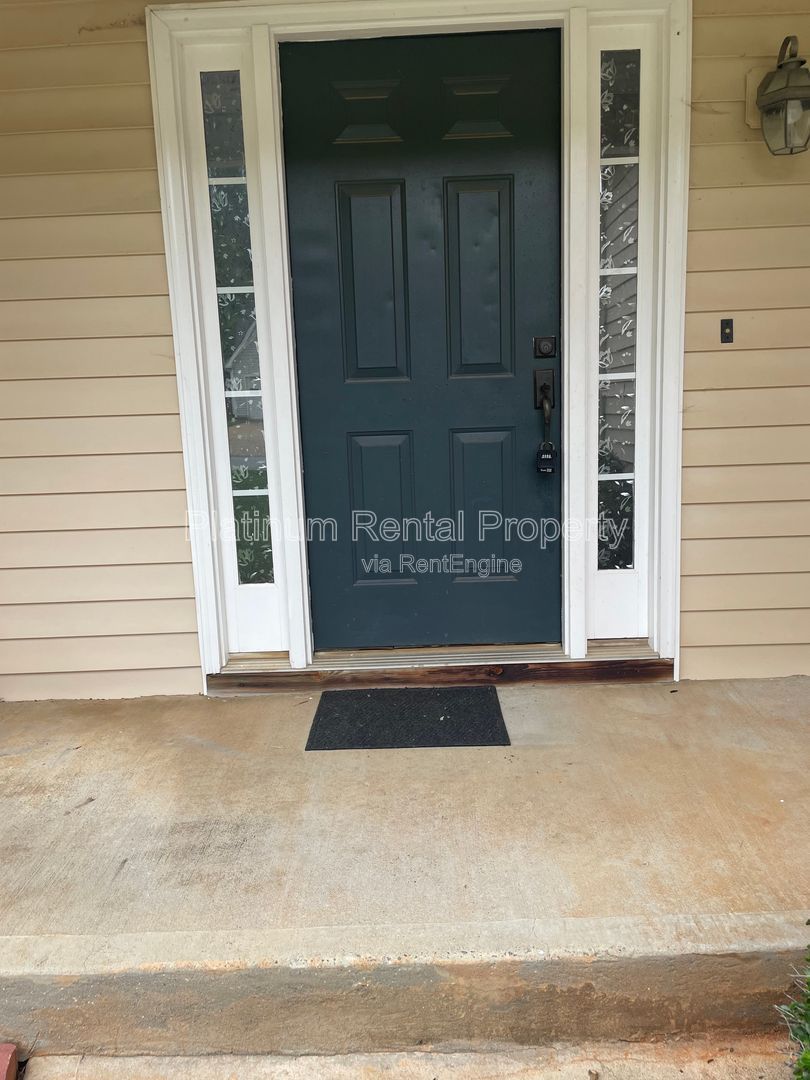 Desirable 4 bedroom floorplan featuring primary suite on the main level by Platinum Property Management Services, Inc. property image