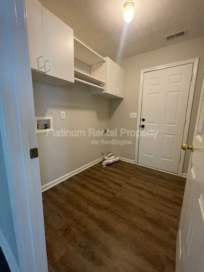 Desirable 4 bedroom floorplan featuring primary suite on the main level by Platinum Property Management Services, Inc. property image
