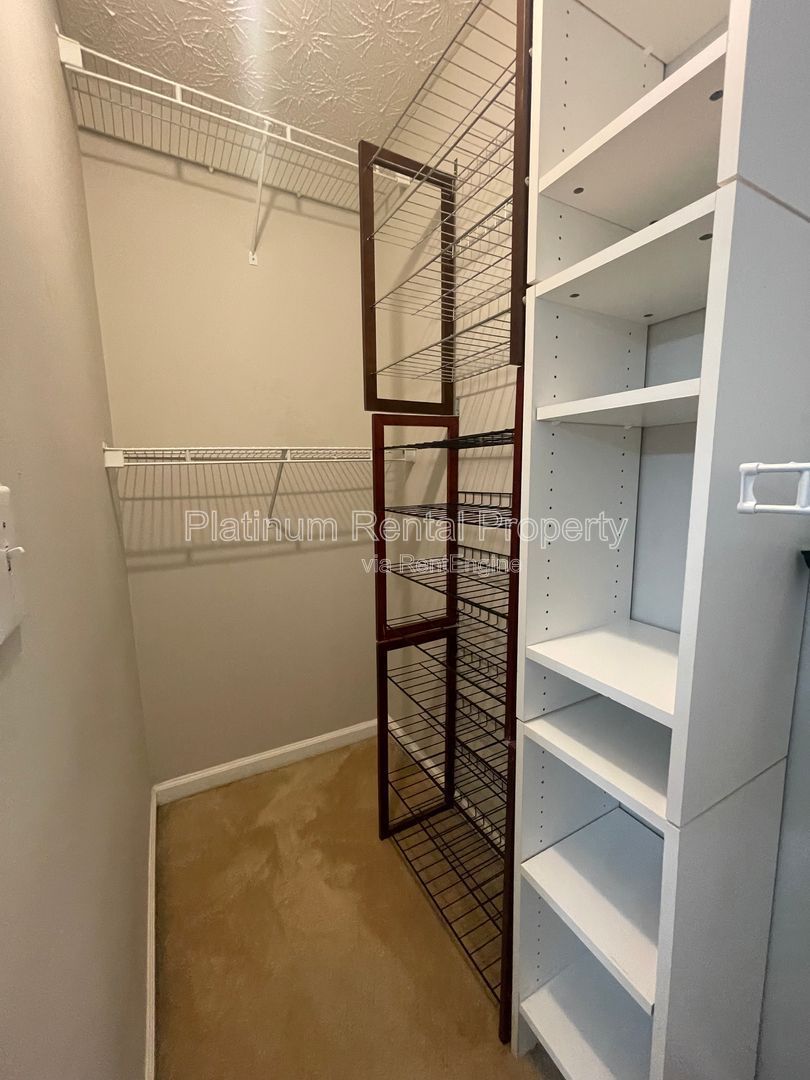 Desirable 4 bedroom floorplan featuring primary suite on the main level by Platinum Property Management Services, Inc. property image