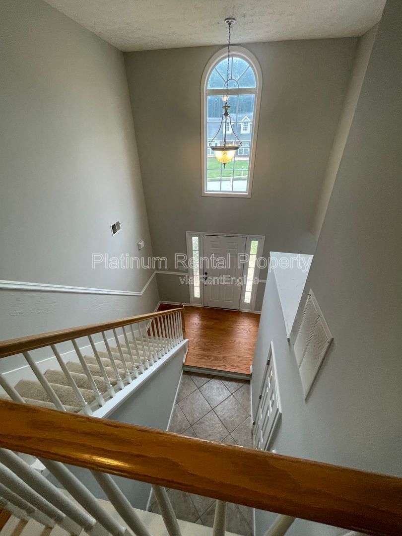 Desirable 4 bedroom floorplan featuring primary suite on the main level by Platinum Property Management Services, Inc. property image