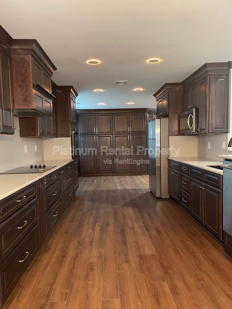 Hard to find 4 bedroom ranch in one of the most desirable areas in Forsyth county, by Platinum Property Management Services, Inc. property image