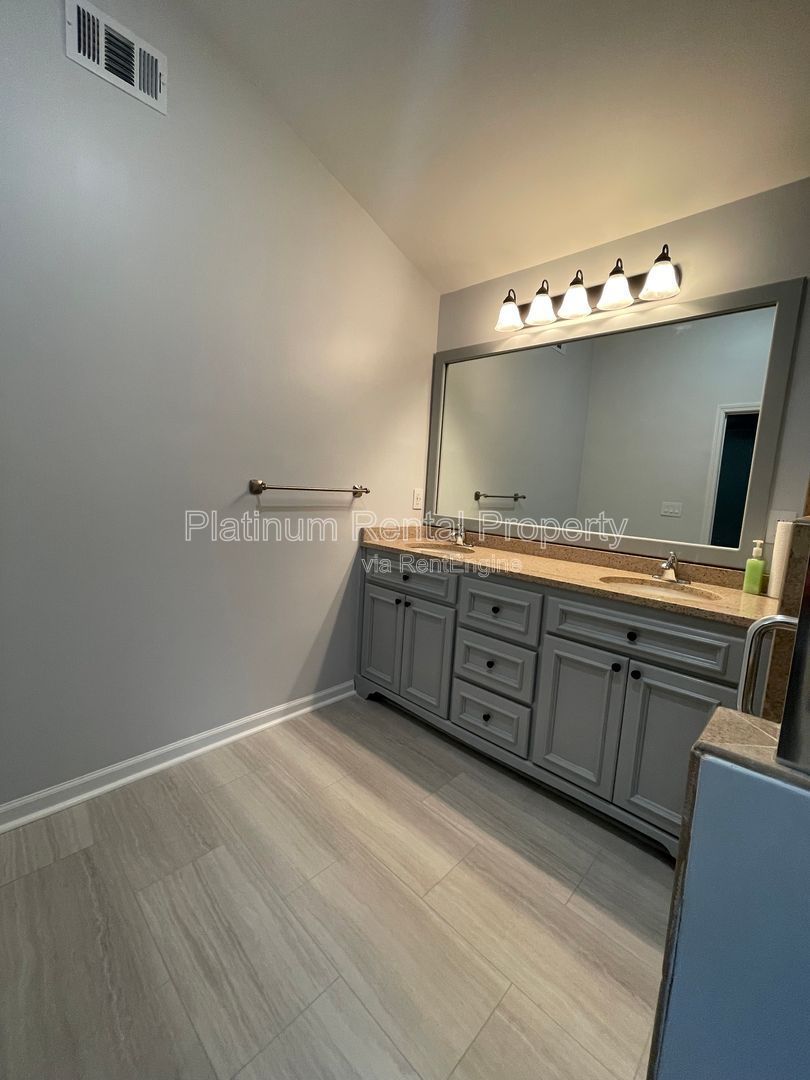 Hard to find 4 bedroom ranch in one of the most desirable areas in Forsyth county, by Platinum Property Management Services, Inc. property image