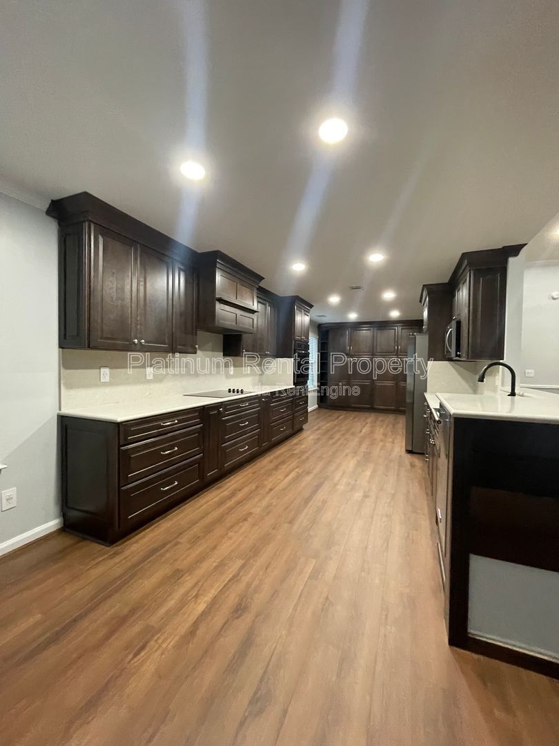 Hard to find 4 bedroom ranch in one of the most desirable areas in Forsyth county, by Platinum Property Management Services, Inc. property image