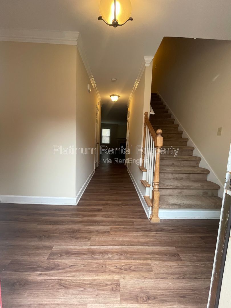 Location, Location, Location! This beautiful and well maintained three-bedroom townhome in convenient Peachtree Corners location is brought to you by Platinum Property Management Services, Inc. property image