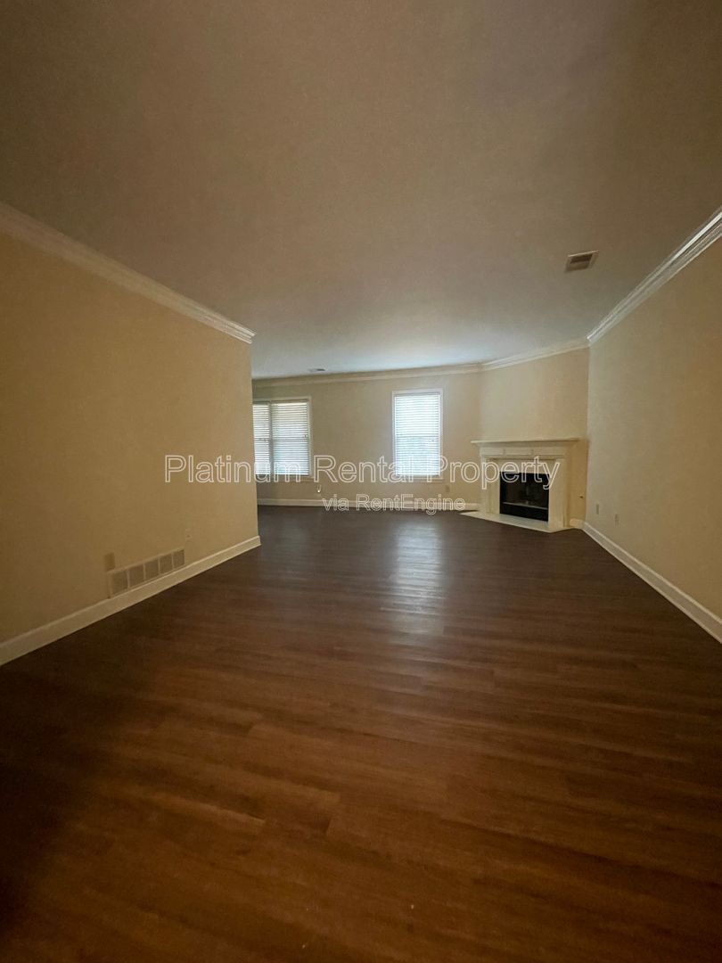 Location, Location, Location! This beautiful and well maintained three-bedroom townhome in convenient Peachtree Corners location is brought to you by Platinum Property Management Services, Inc. property image