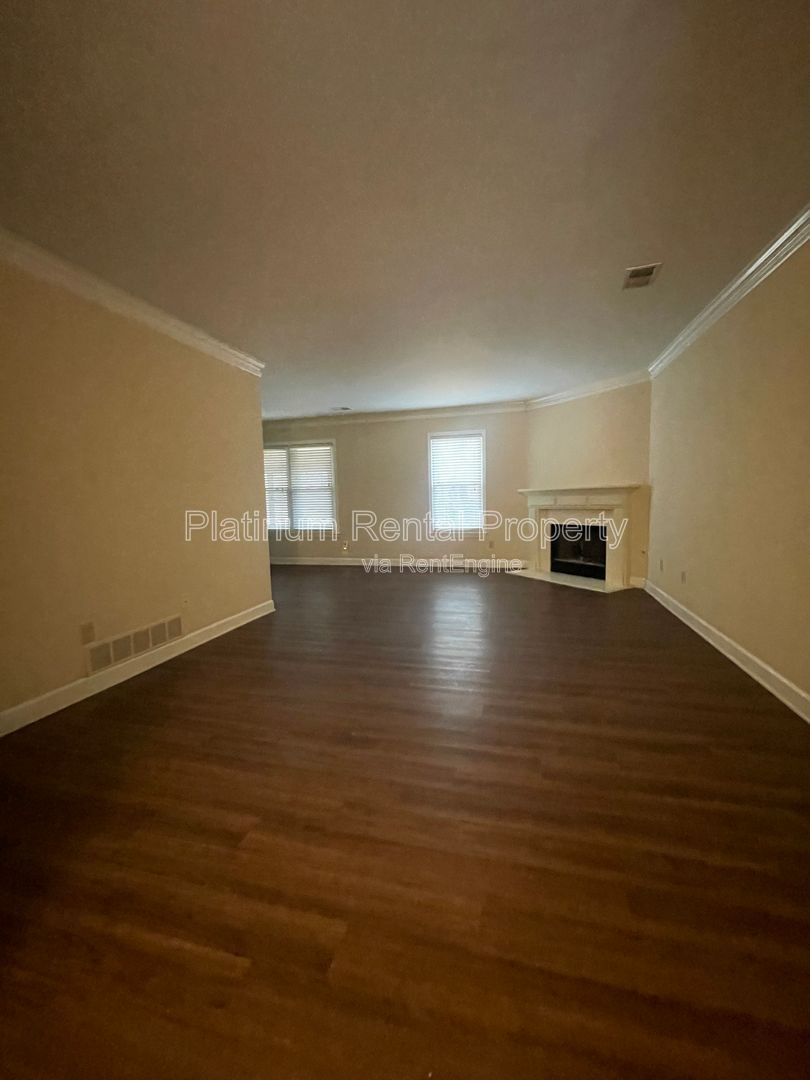 Location, Location, Location! This beautiful and well maintained three-bedroom townhome in convenient Peachtree Corners location is brought to you by Platinum Property Management Services, Inc. property image