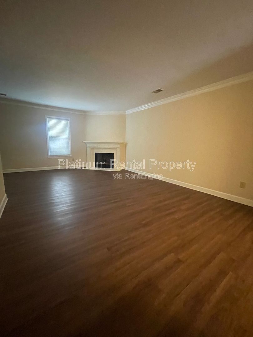 Location, Location, Location! This beautiful and well maintained three-bedroom townhome in convenient Peachtree Corners location is brought to you by Platinum Property Management Services, Inc. property image