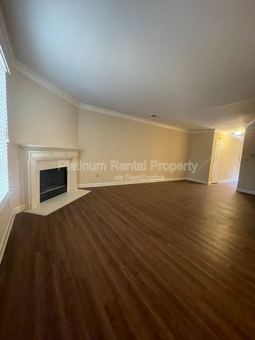 Location, Location, Location! This beautiful and well maintained three-bedroom townhome in convenient Peachtree Corners location is brought to you by Platinum Property Management Services, Inc. property image