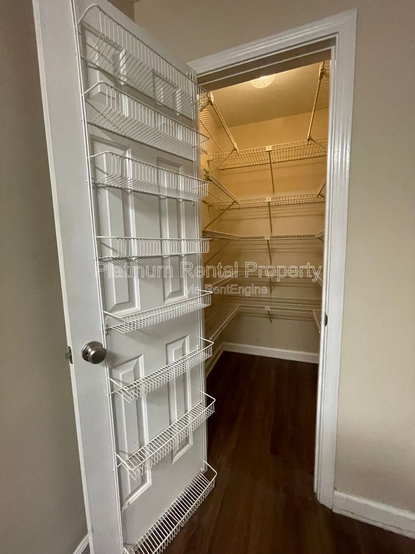 Location, Location, Location! This beautiful and well maintained three-bedroom townhome in convenient Peachtree Corners location is brought to you by Platinum Property Management Services, Inc. property image