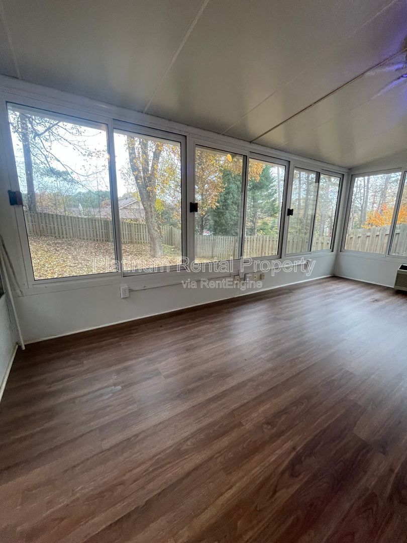 Location, Location, Location! This beautiful and well maintained three-bedroom townhome in convenient Peachtree Corners location is brought to you by Platinum Property Management Services, Inc. property image