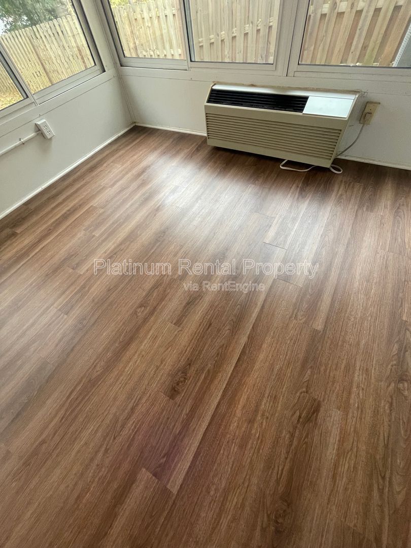 Location, Location, Location! This beautiful and well maintained three-bedroom townhome in convenient Peachtree Corners location is brought to you by Platinum Property Management Services, Inc. property image