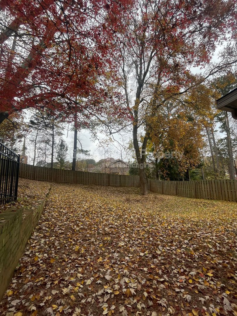 Location, Location, Location! This beautiful and well maintained three-bedroom townhome in convenient Peachtree Corners location is brought to you by Platinum Property Management Services, Inc. property image