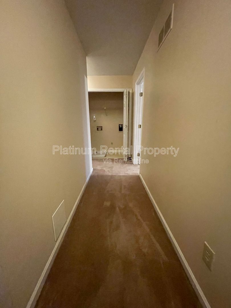 Location, Location, Location! This beautiful and well maintained three-bedroom townhome in convenient Peachtree Corners location is brought to you by Platinum Property Management Services, Inc. property image