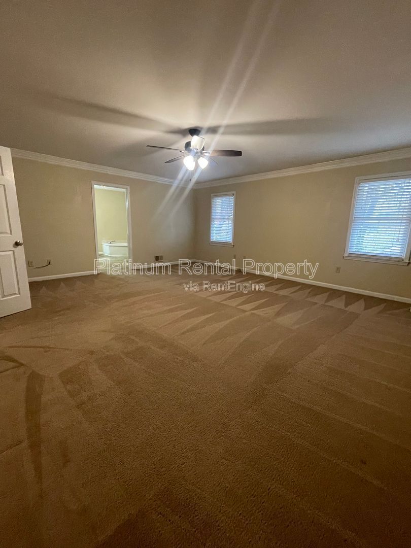 Location, Location, Location! This beautiful and well maintained three-bedroom townhome in convenient Peachtree Corners location is brought to you by Platinum Property Management Services, Inc. property image