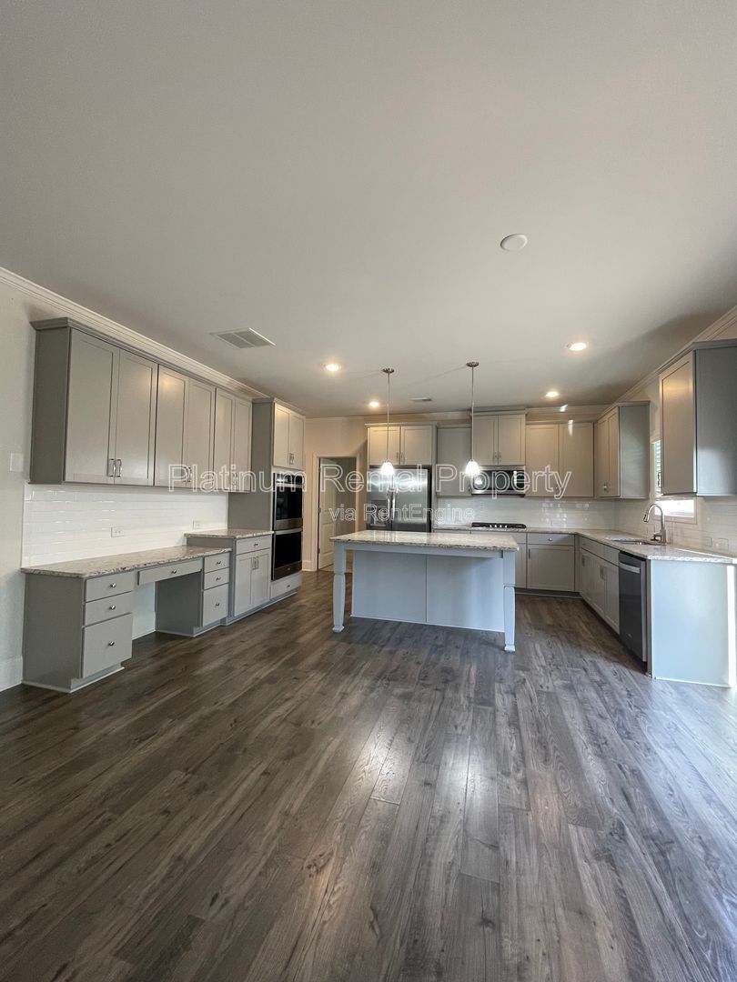 Stunning, 5-bedroom home in the highly sought after Tributary Community, by Platinum Property Management Services, Inc. property image