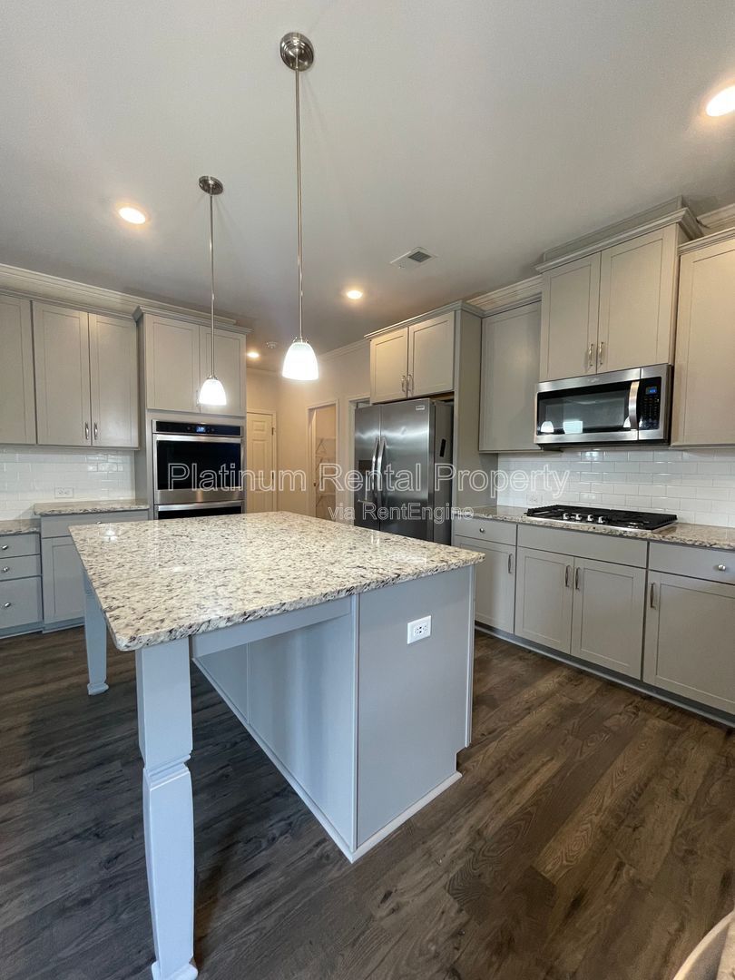 Stunning, 5-bedroom home in the highly sought after Tributary Community, by Platinum Property Management Services, Inc. property image