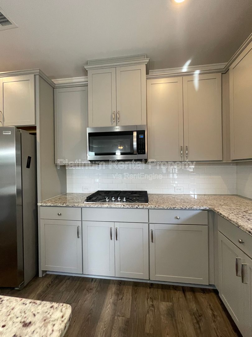 Stunning, 5-bedroom home in the highly sought after Tributary Community, by Platinum Property Management Services, Inc. property image