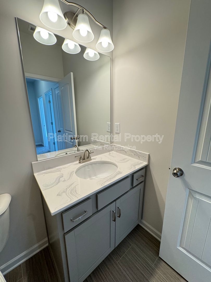 Better than new, 3 bedroom townhome in highly desirable Sugar Hill community by Platinum Property Management Services, Inc. property image