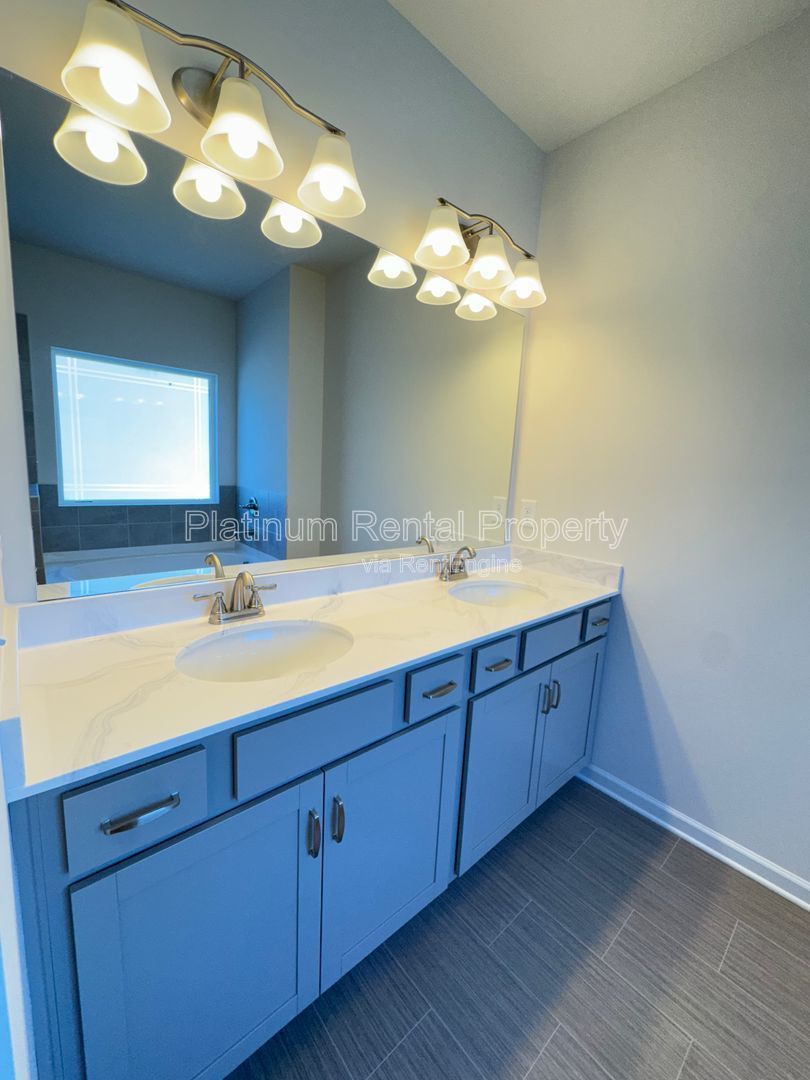 Better than new, 3 bedroom townhome in highly desirable Sugar Hill community by Platinum Property Management Services, Inc. property image