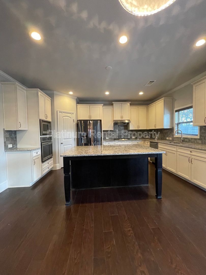 Spacious and immaculate 5-bedroom executive home in the heart of Cumming by Platinum Property Management Services, Inc. property image