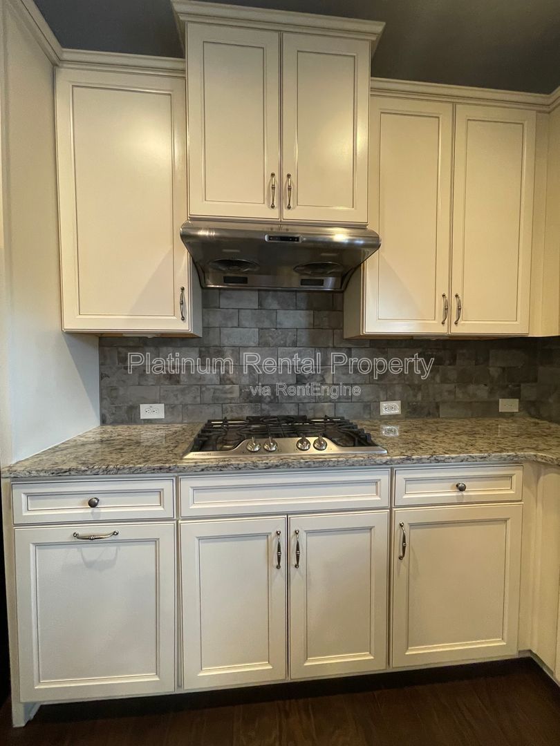 Spacious and immaculate 5-bedroom executive home in the heart of Cumming by Platinum Property Management Services, Inc. property image