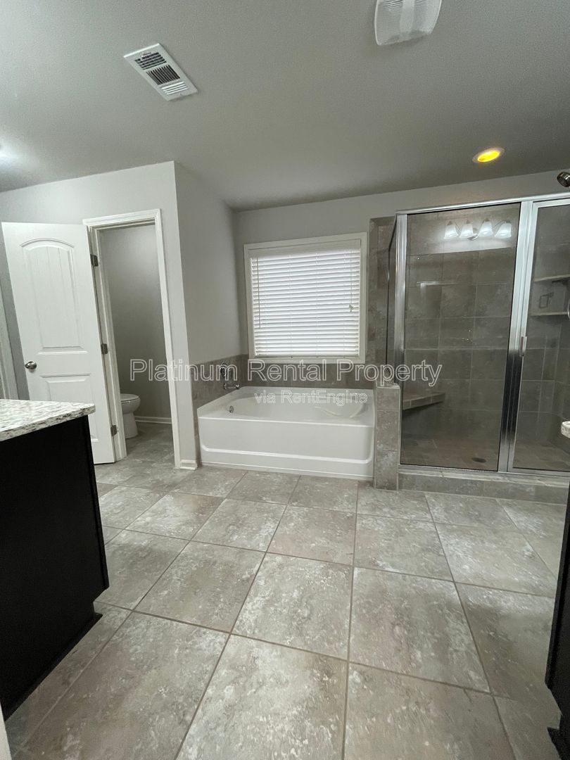 Spacious and immaculate 5-bedroom executive home in the heart of Cumming by Platinum Property Management Services, Inc. property image