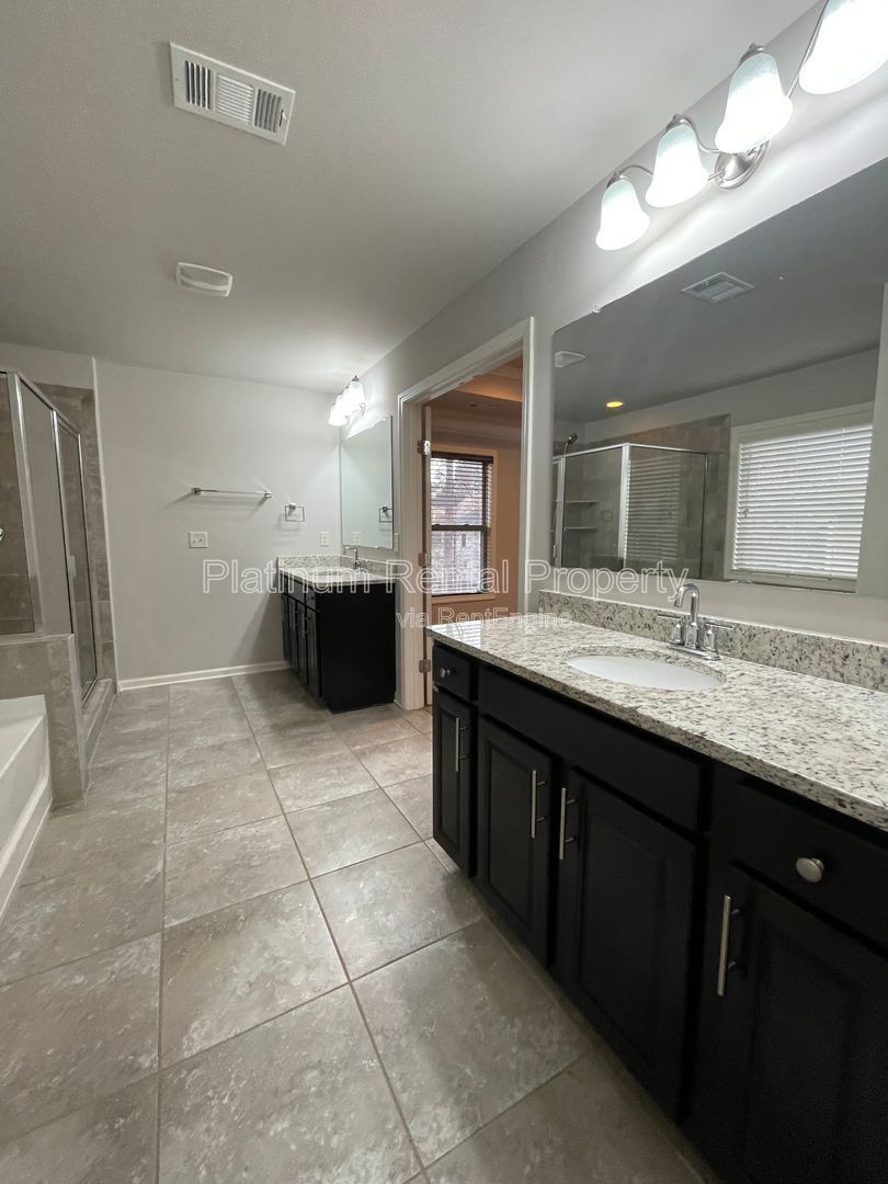 Spacious and immaculate 5-bedroom executive home in the heart of Cumming by Platinum Property Management Services, Inc. property image