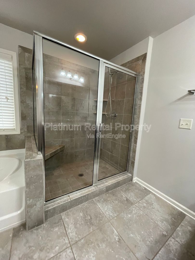 Spacious and immaculate 5-bedroom executive home in the heart of Cumming by Platinum Property Management Services, Inc. property image