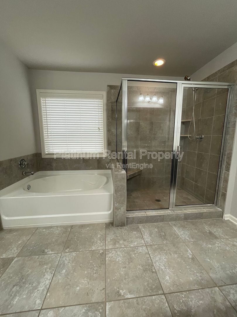 Spacious and immaculate 5-bedroom executive home in the heart of Cumming by Platinum Property Management Services, Inc. property image