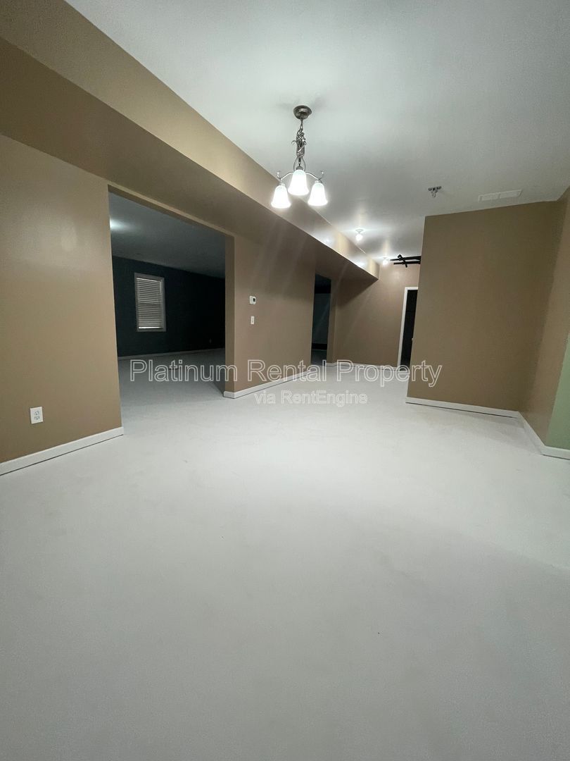 Spacious and immaculate 5-bedroom executive home in the heart of Cumming by Platinum Property Management Services, Inc. property image