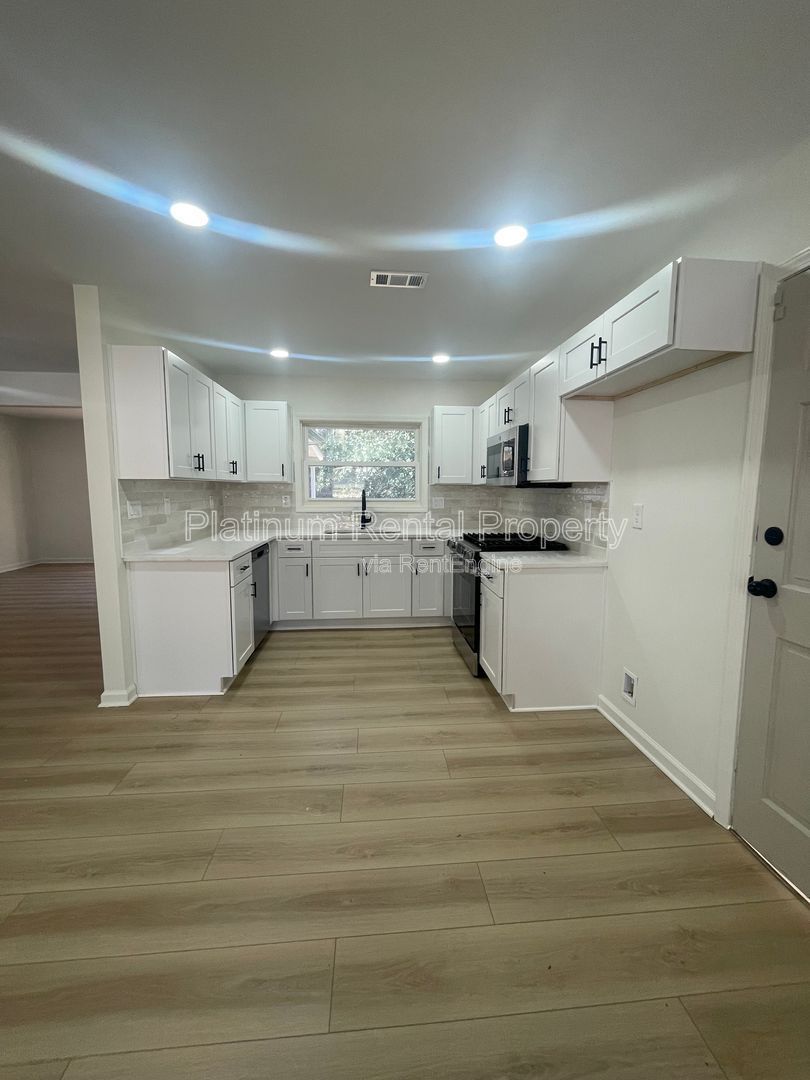 Simply exquisite, 1960's brick ranch on a basement in fantastic Cascade location, by Platinum Property Management Services, Inc. property image