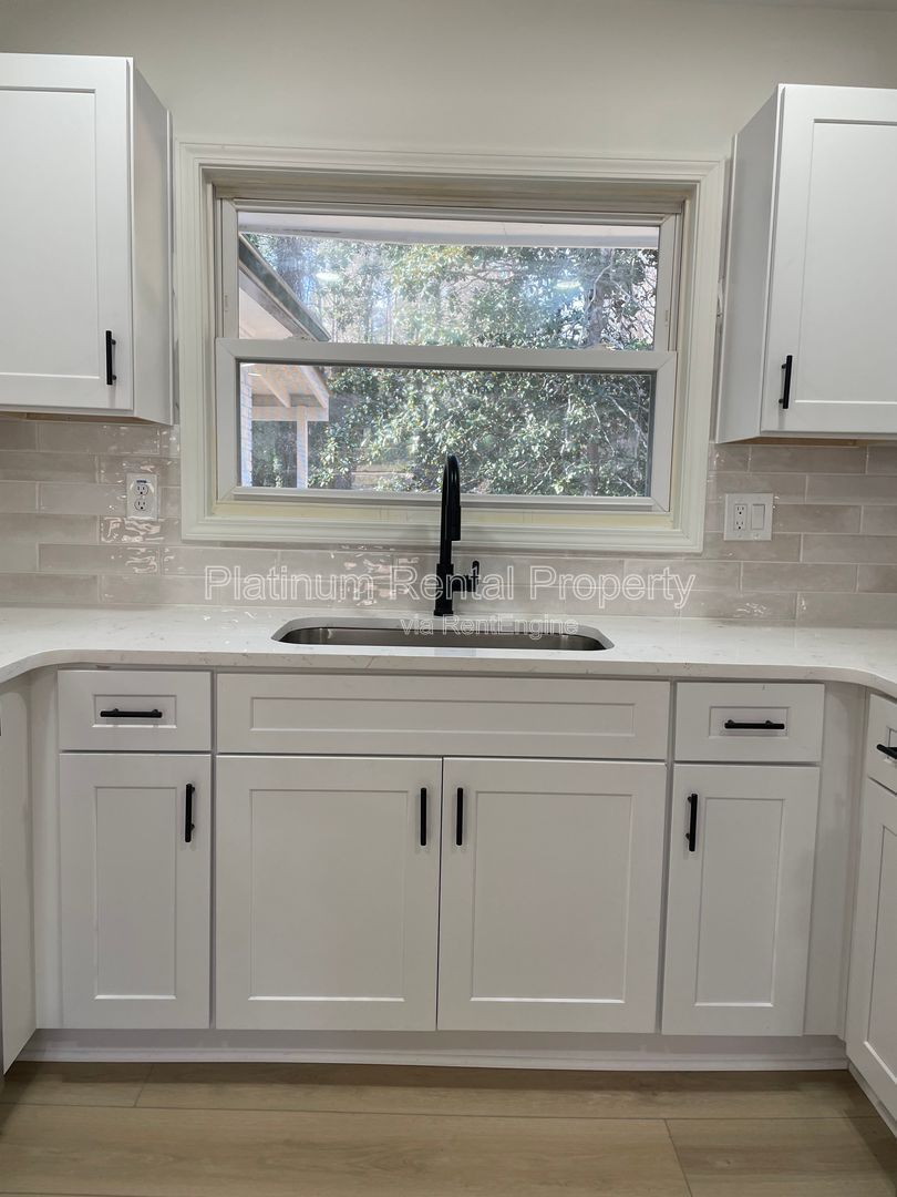 Simply exquisite, 1960's brick ranch on a basement in fantastic Cascade location, by Platinum Property Management Services, Inc. property image