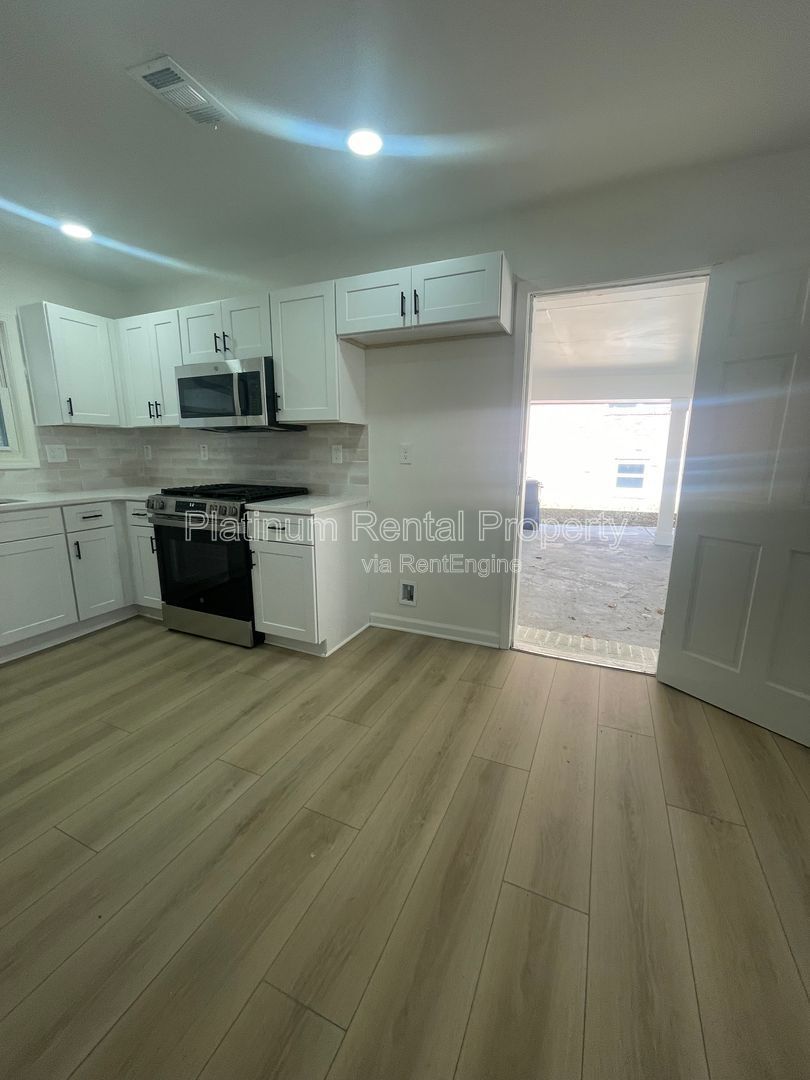 Simply exquisite, 1960's brick ranch on a basement in fantastic Cascade location, by Platinum Property Management Services, Inc. property image